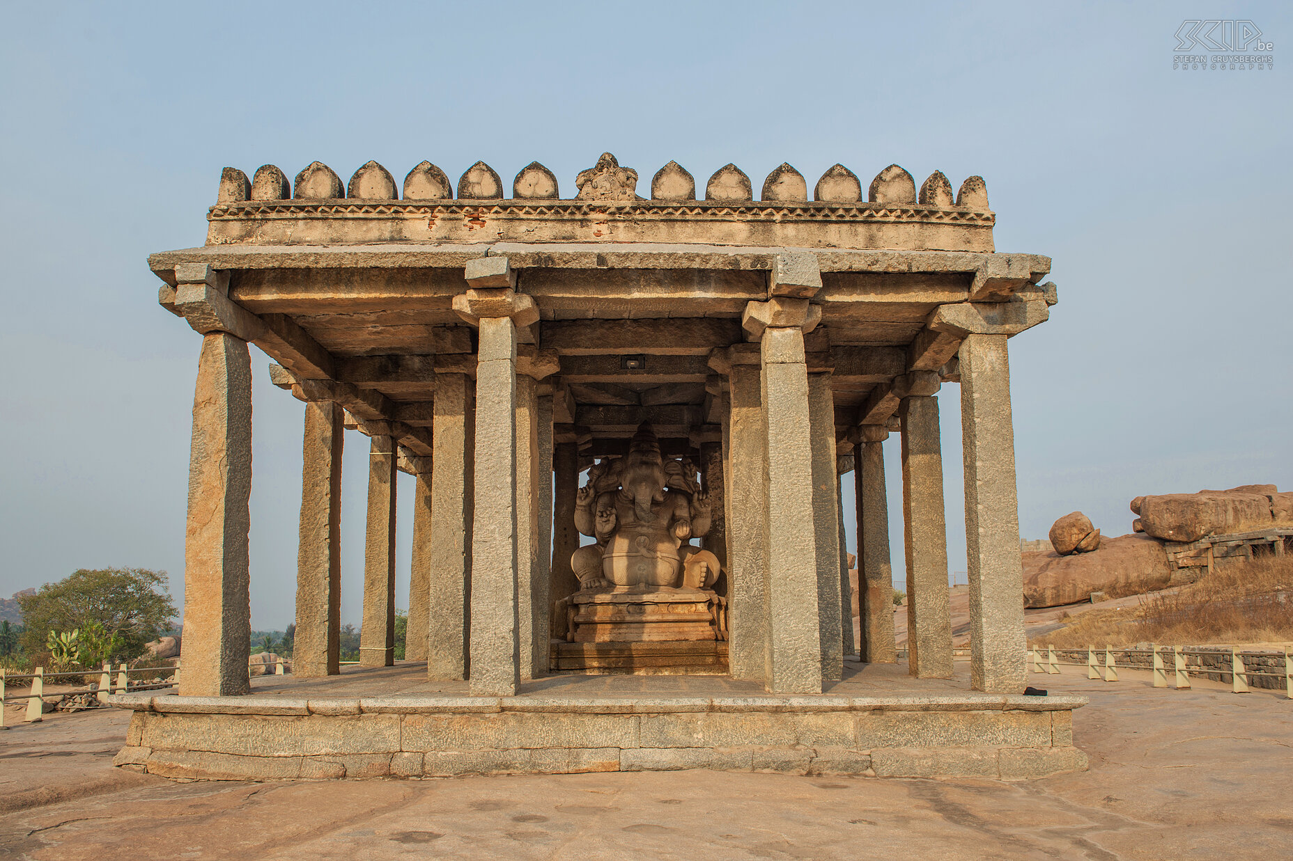 Hampi - Ganesha temple On southern foothill of the Hemkuta hill there is a small temple with a giant statue of Ganesha. It has been carved out of a huge boulder and it is one of the largest sculptures in Hampi. The ruins at Hampi, which was the capital city of the Vijayanagara empire, are listed as a UNESCO World Heritage Site. Stefan Cruysberghs